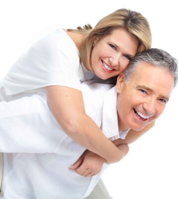 Seniors couple in love. Isolated over white background